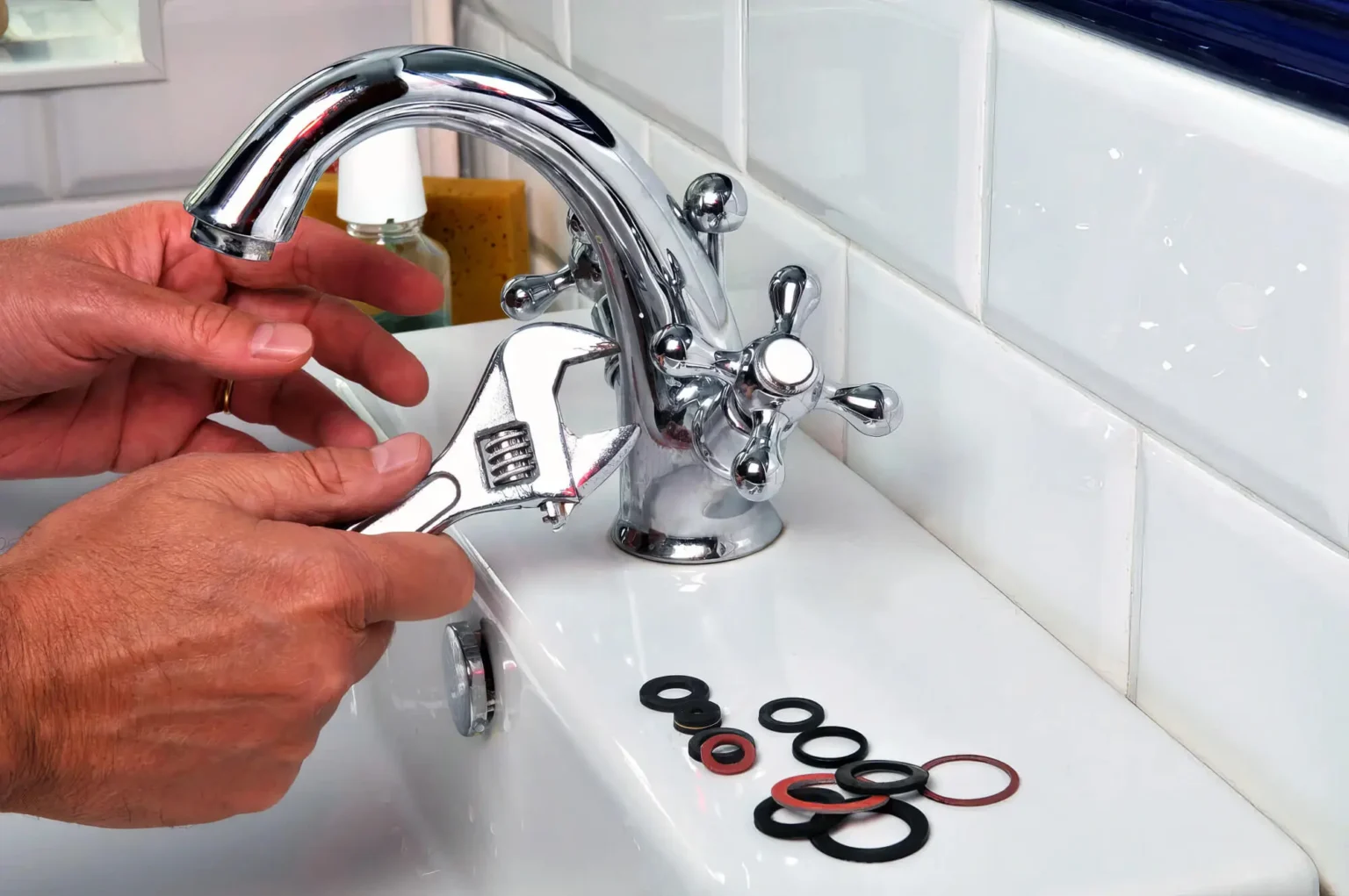 Plumber maintaining a bathroom faucet in Palo Alto