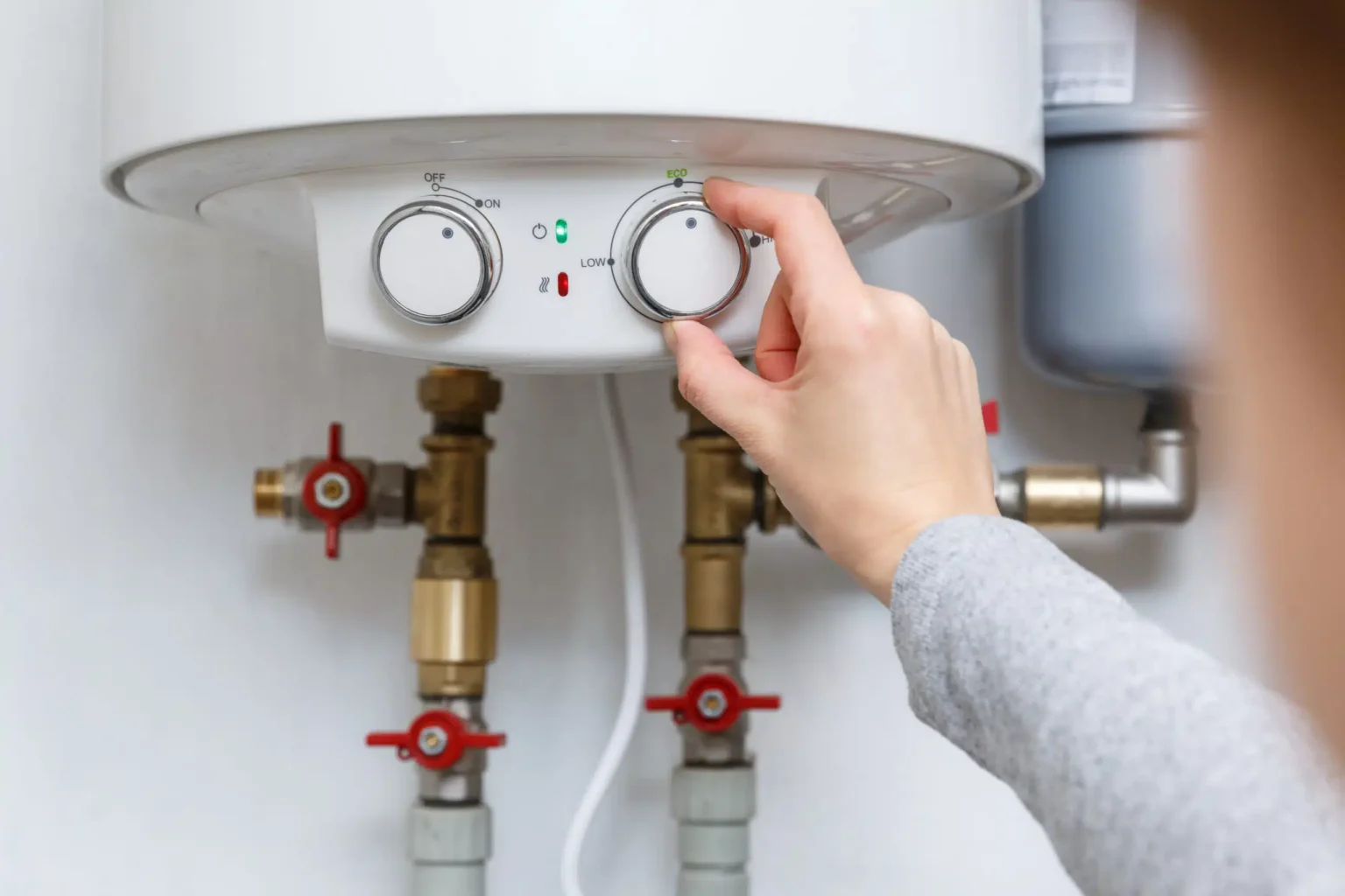 Technician adjusting a water heater in Palo Alto